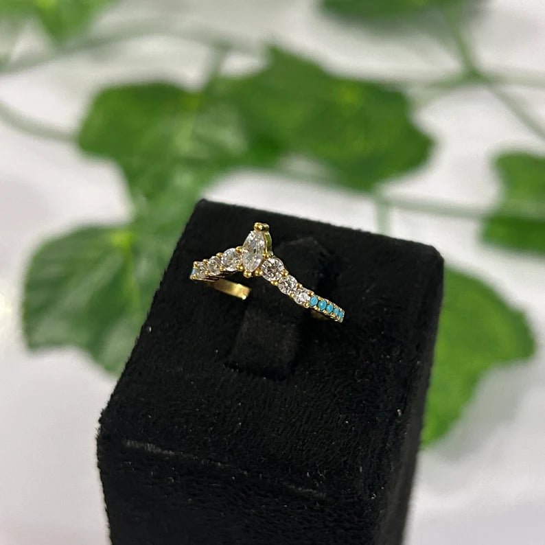 Ring aus 10 kt Gelbgold mit Marquise-Diamant und Türkis